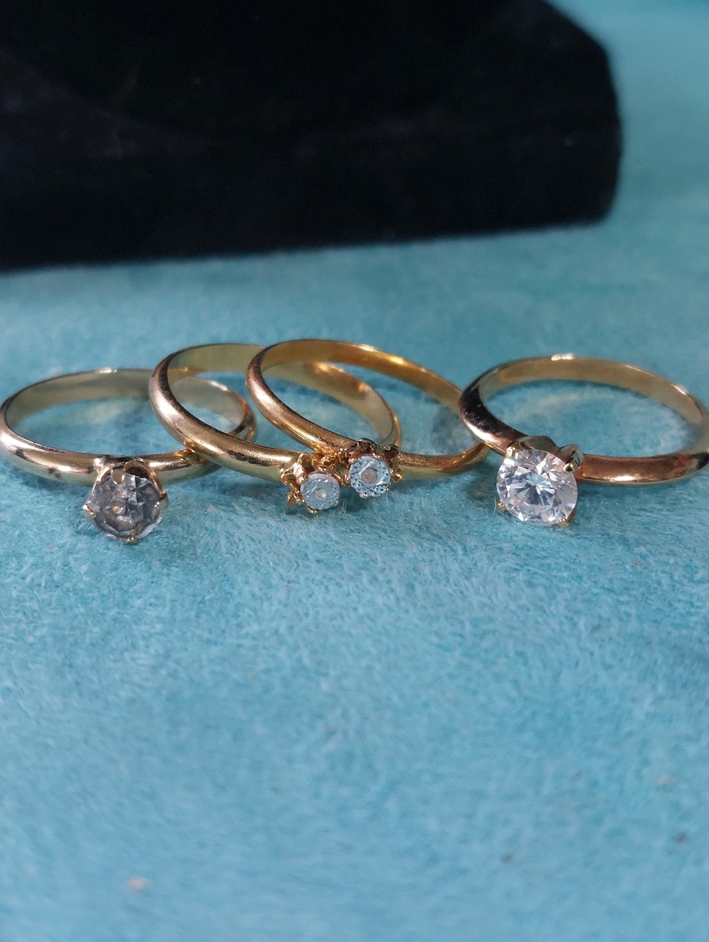 Four Rhinestone Goldtone Stackable Rings - Picture 7 of 15